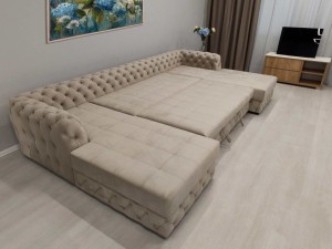 Canapea contemporană cu elemente Capitone